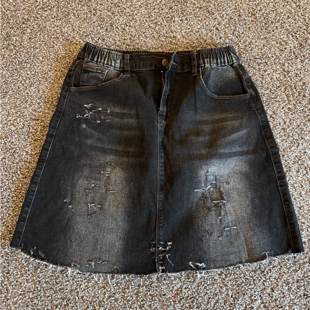 Black denim distressed mini skirt
